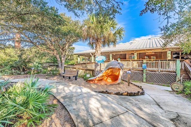 exterior space featuring metal roof