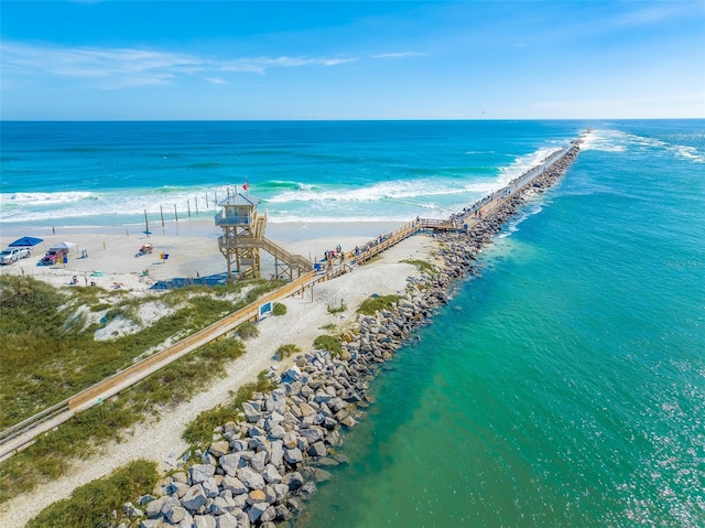 bird's eye view featuring a beach view and a water view