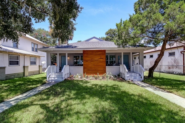 view of front of house with a front lawn