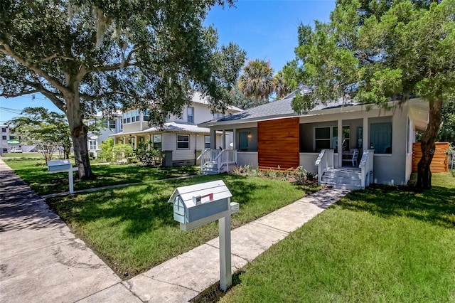 view of front of home with a front yard