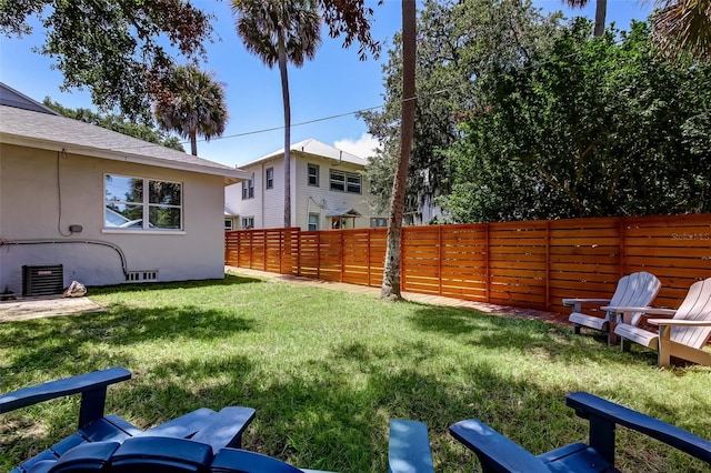 view of yard with central AC