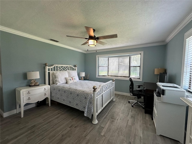 bedroom with a textured ceiling, ceiling fan, ornamental molding, and dark wood-type flooring