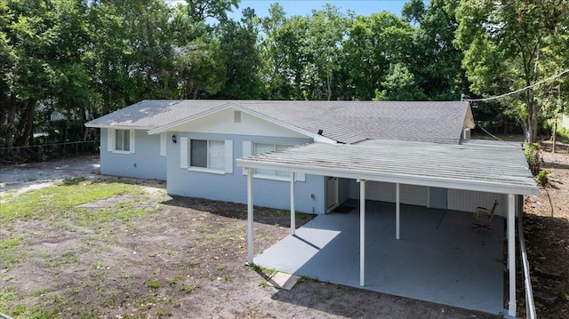 view of front of house with a carport