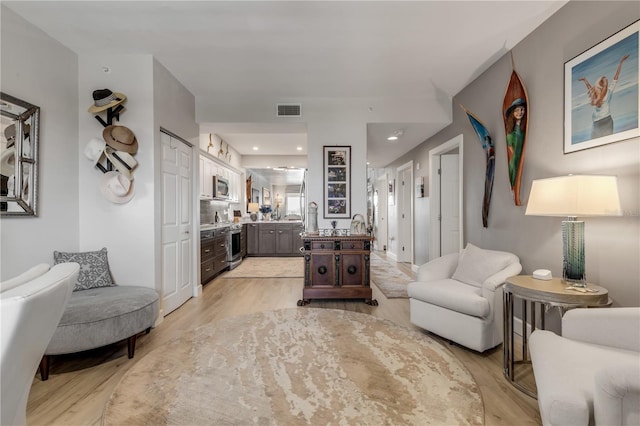 living area with light wood-type flooring