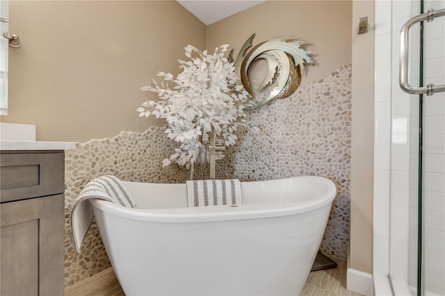 bathroom featuring a bathtub and vanity