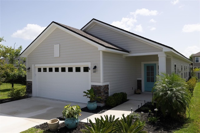 view of front of home with a garage