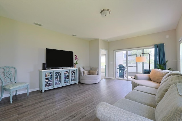 living room with dark wood-type flooring