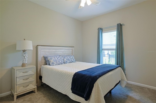 bedroom featuring light colored carpet and ceiling fan