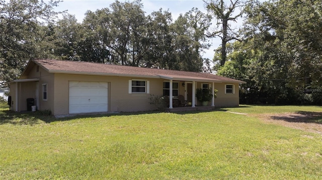 ranch-style house with an attached garage, brick siding, covered porch, and a front yard