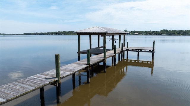 view of dock with a water view and boat lift