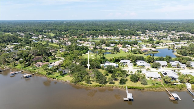 birds eye view of property featuring a residential view and a water view