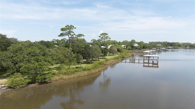 exterior space with a water view