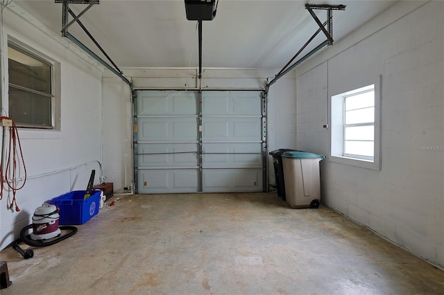 garage featuring a garage door opener