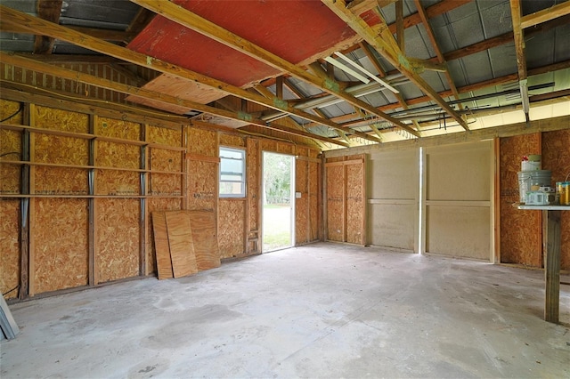 miscellaneous room featuring unfinished concrete floors