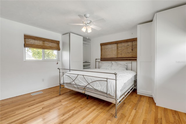bedroom featuring ceiling fan and light wood-type flooring