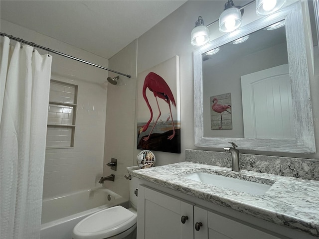 full bathroom featuring shower / tub combo, vanity, and toilet