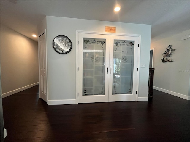 interior space with french doors and dark hardwood / wood-style flooring