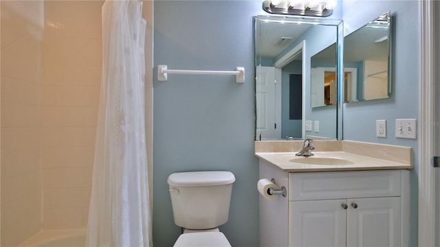 full bathroom featuring vanity, toilet, and shower / bath combination with curtain