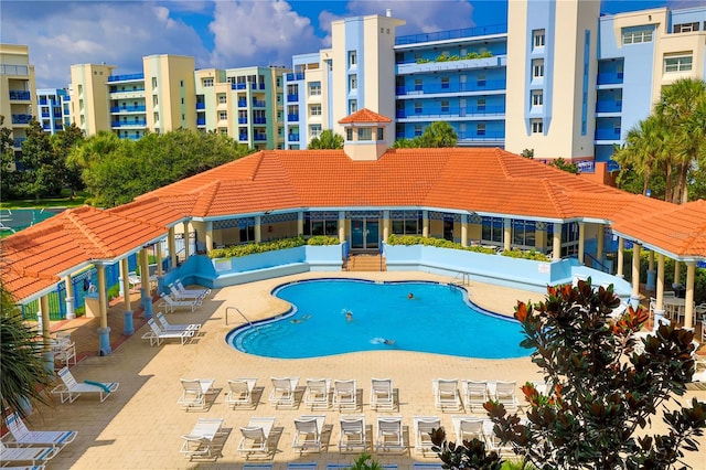 view of swimming pool featuring a patio area