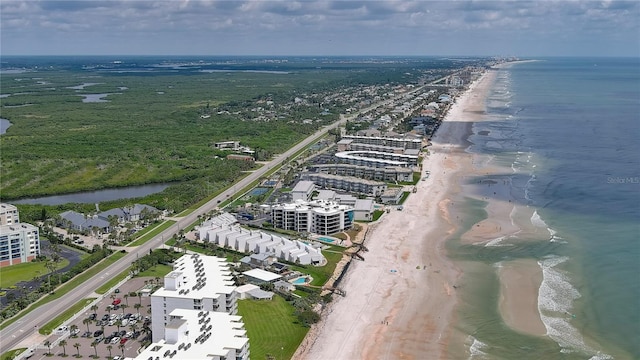 aerial view featuring a water view and a beach view