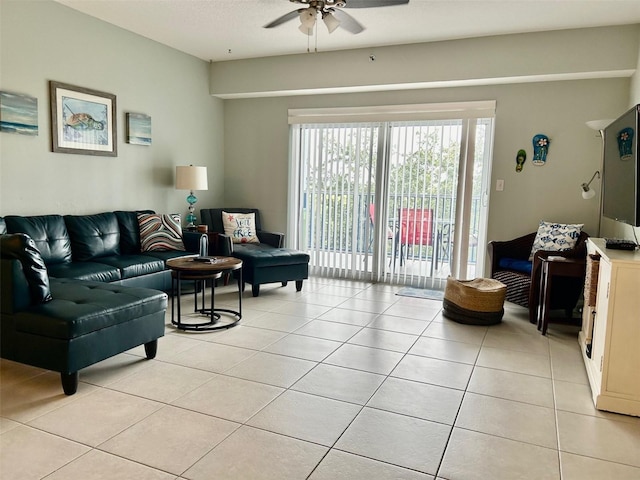 living room with light tile patterned floors and ceiling fan