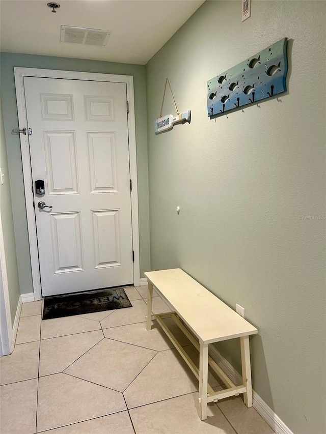 interior space featuring light tile patterned floors