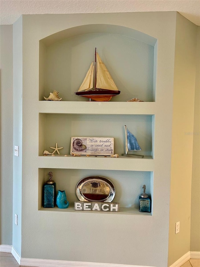 room details featuring built in features and a textured ceiling