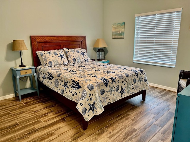 bedroom with wood-type flooring