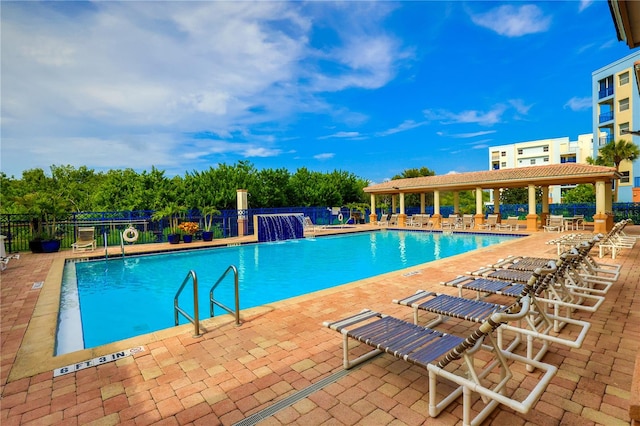 view of swimming pool featuring pool water feature