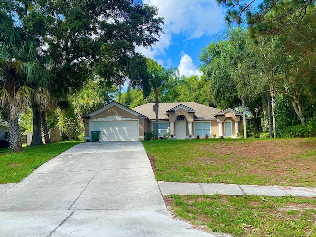 single story home featuring stucco siding, a front lawn, concrete driveway, and a garage