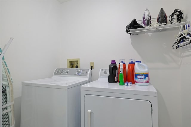 clothes washing area featuring washing machine and dryer