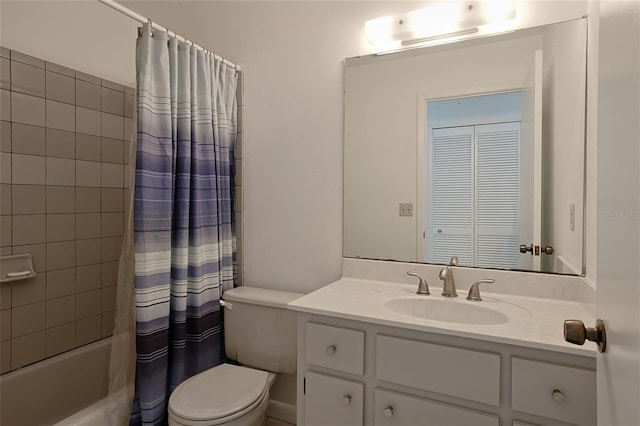 full bathroom with shower / tub combo, vanity, and toilet