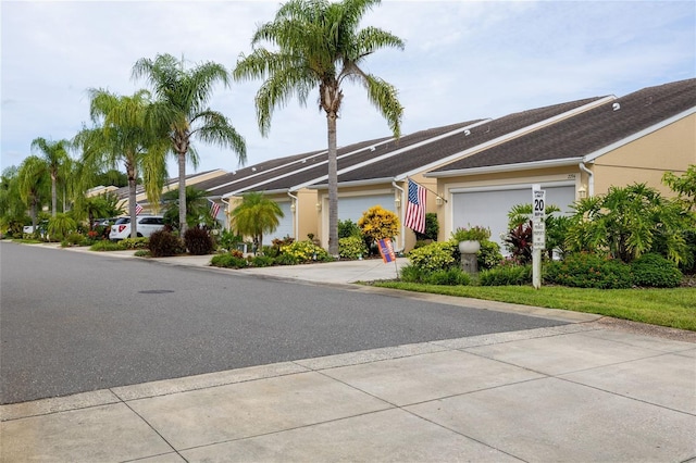 view of front of property with a garage