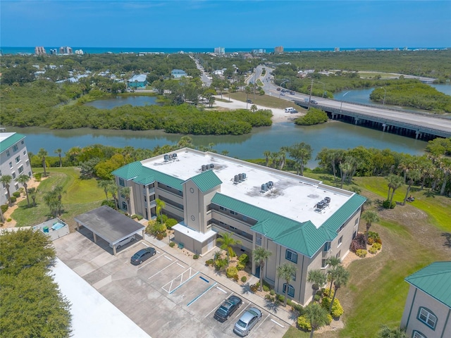 drone / aerial view with a water view