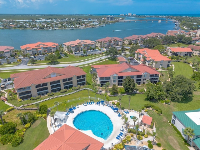 aerial view with a water view and a residential view