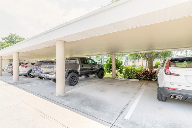 view of car parking with a carport