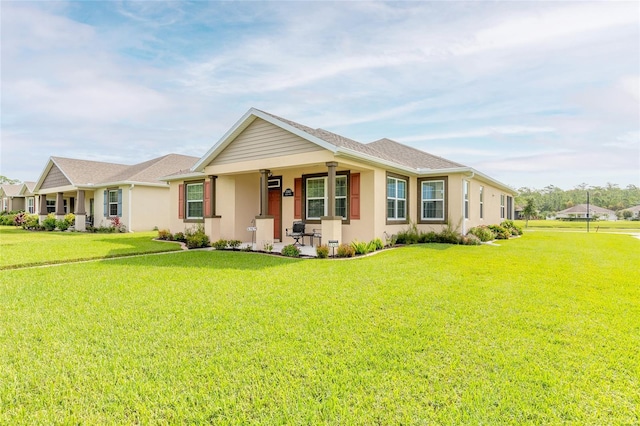 ranch-style house featuring a front yard