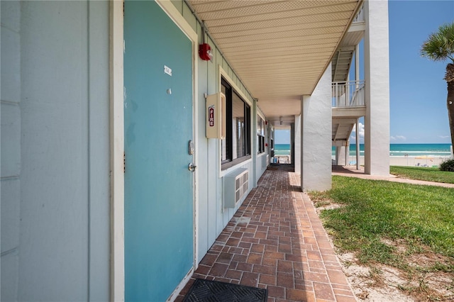 entrance to property featuring a water view