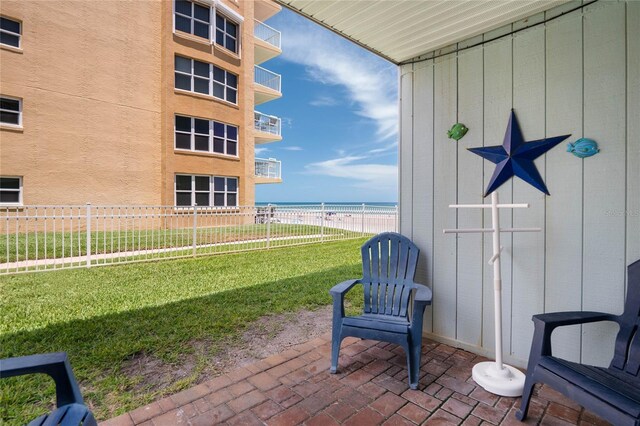 view of patio / terrace with a water view