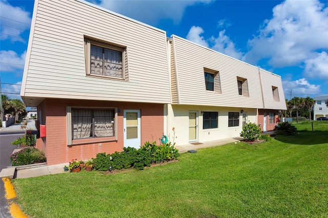 exterior space featuring a front lawn