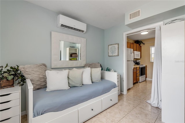 tiled bedroom with a wall mounted AC and white fridge