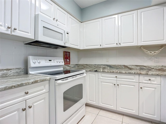 kitchen featuring white cabinetry and white appliances