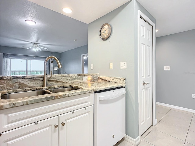 kitchen featuring sink, ceiling fan, dishwasher, white cabinets, and light tile patterned flooring