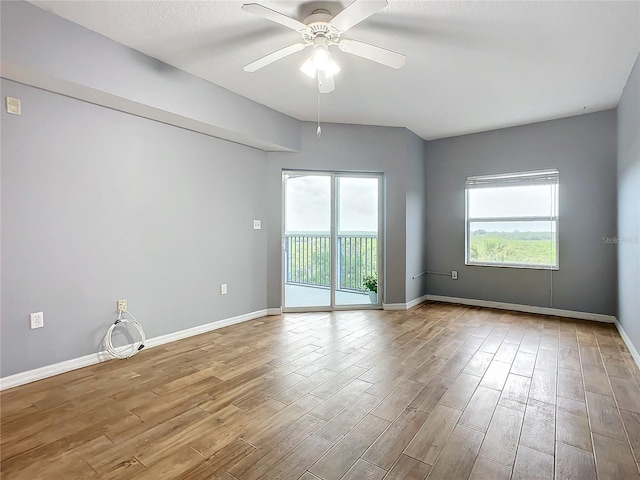 unfurnished room featuring ceiling fan and light hardwood / wood-style flooring