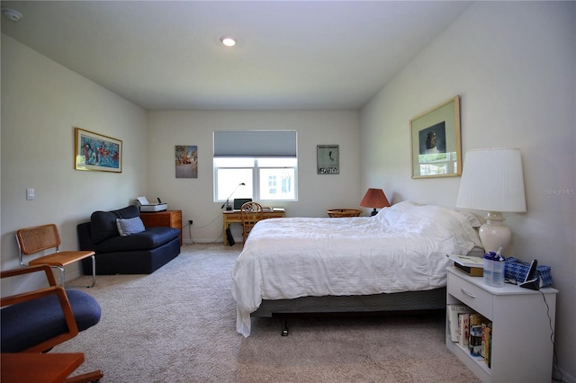 bedroom with light carpet