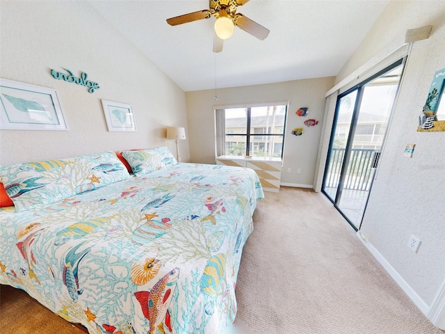 carpeted bedroom with ceiling fan, lofted ceiling, and access to exterior