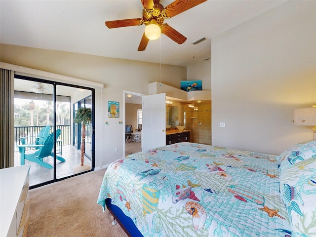 carpeted bedroom featuring lofted ceiling, access to outside, and ensuite bath