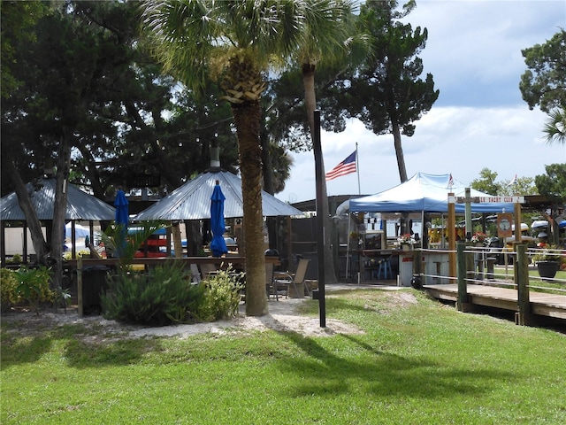 exterior space featuring a yard and a gazebo