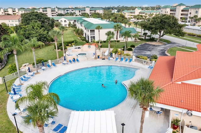 view of swimming pool with a patio area