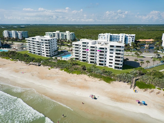 aerial view featuring a beach view and a water view